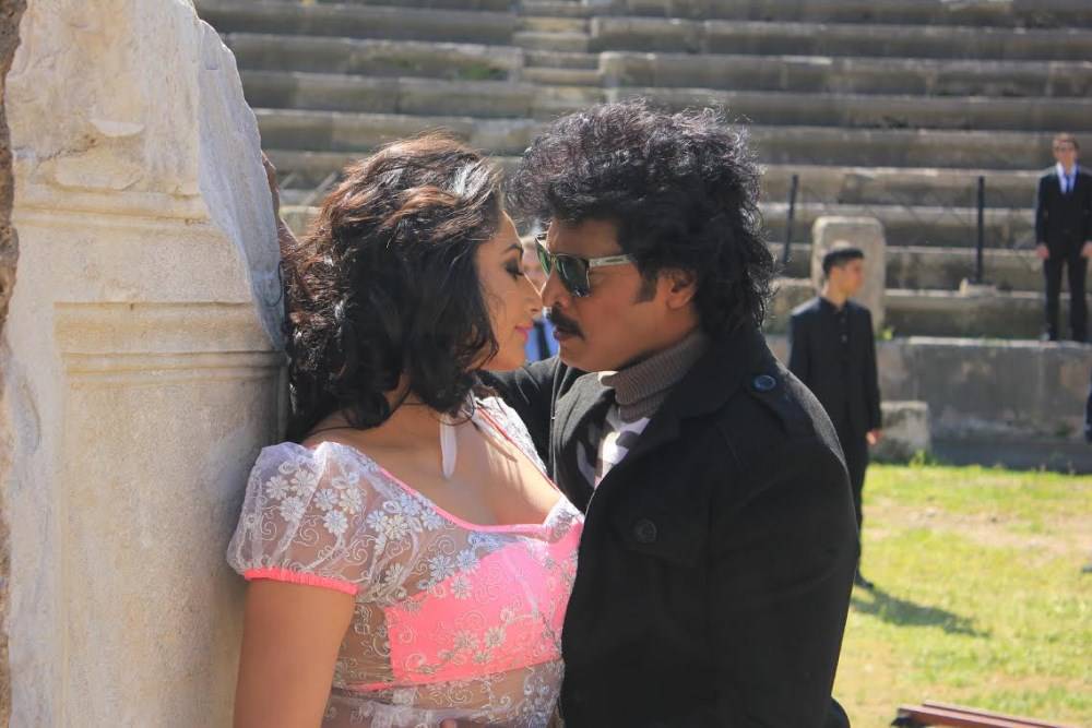 Upendra, Ragini Dwivedi stills from Brahmana Movie