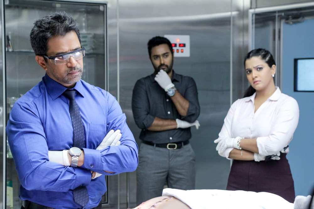 Latest Stills from Nibunan Tamil Movie