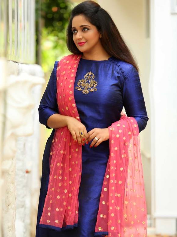 Actress Kavya Madhavan stills.