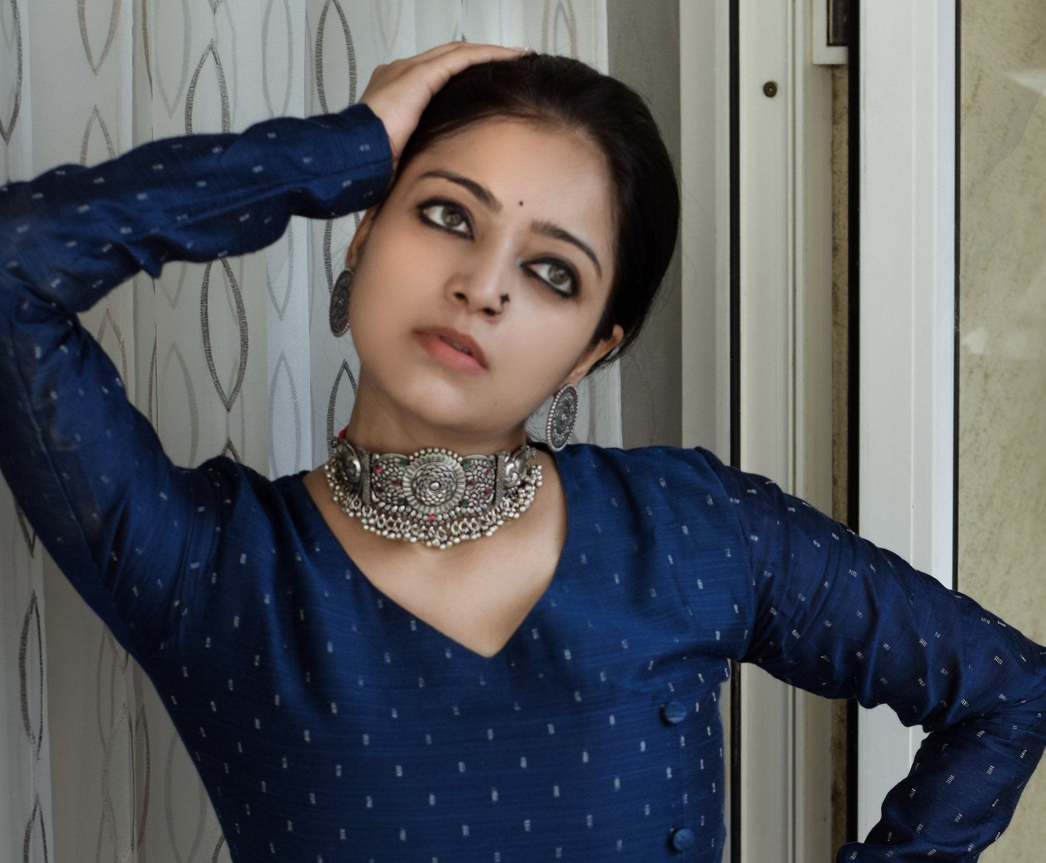 Actress Janani Iyer Sizzling Stills.